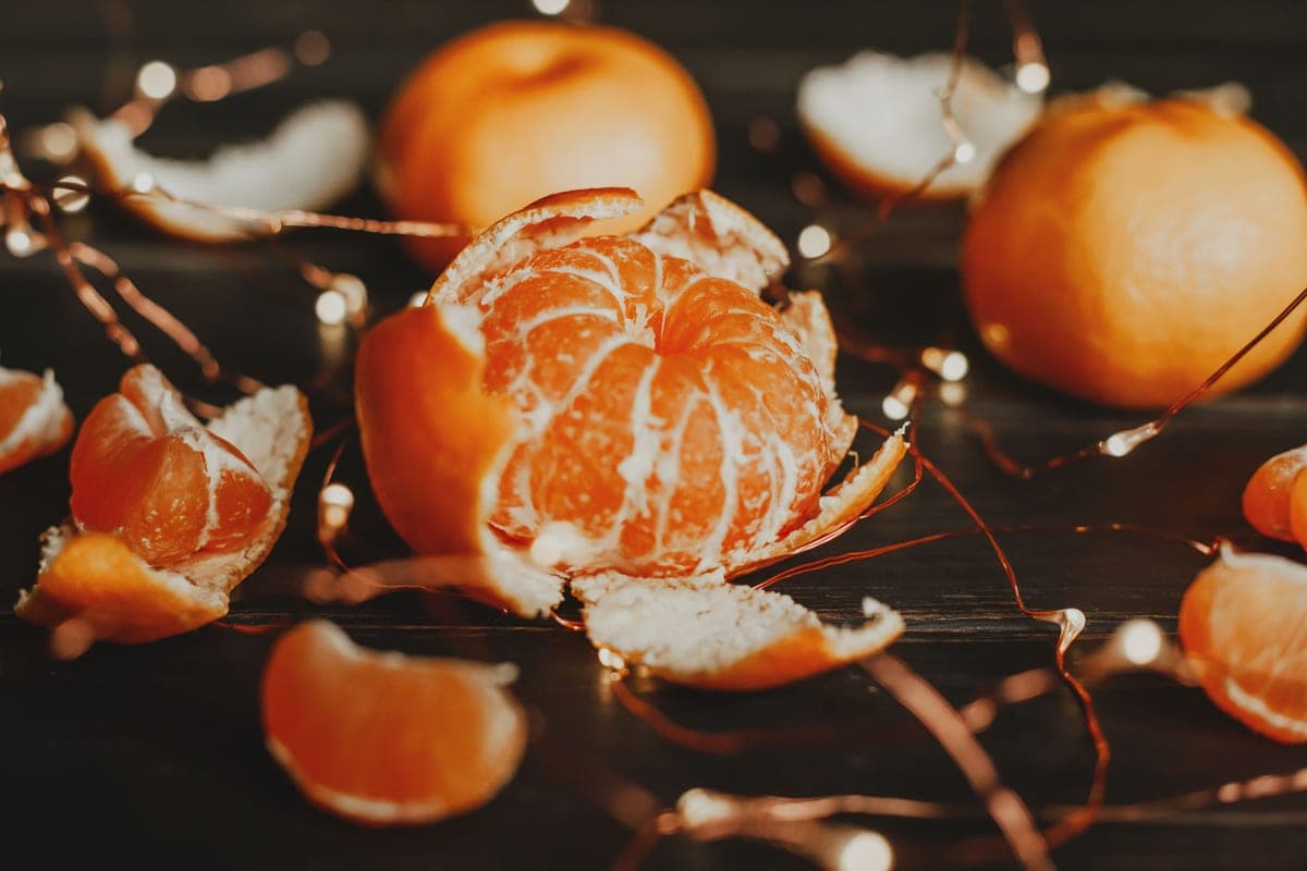 Bergamot peel and citrus fruit on a dark background