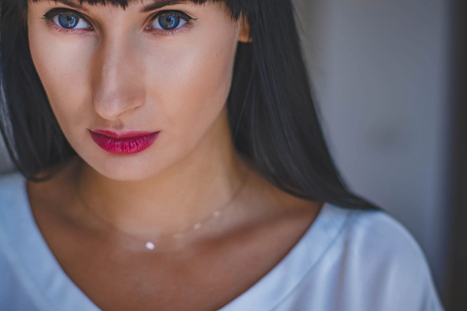 A close-up portrait of skin with a natural sheen