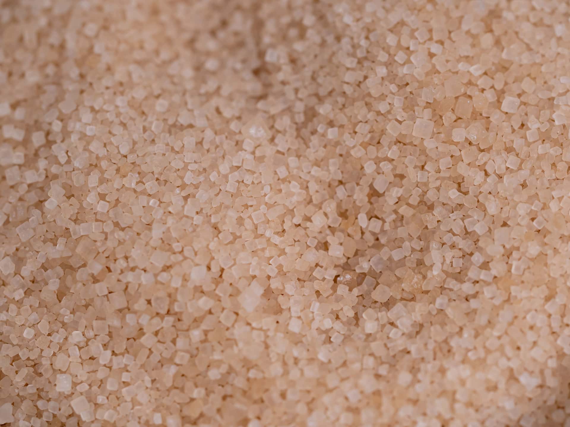 A close-up of coarse sugar crystals