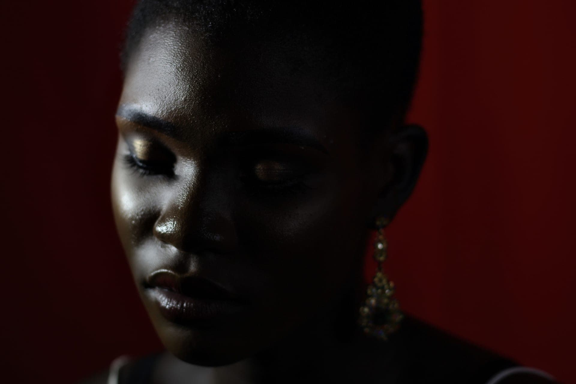 Even, radiant skin photographed in low directional light