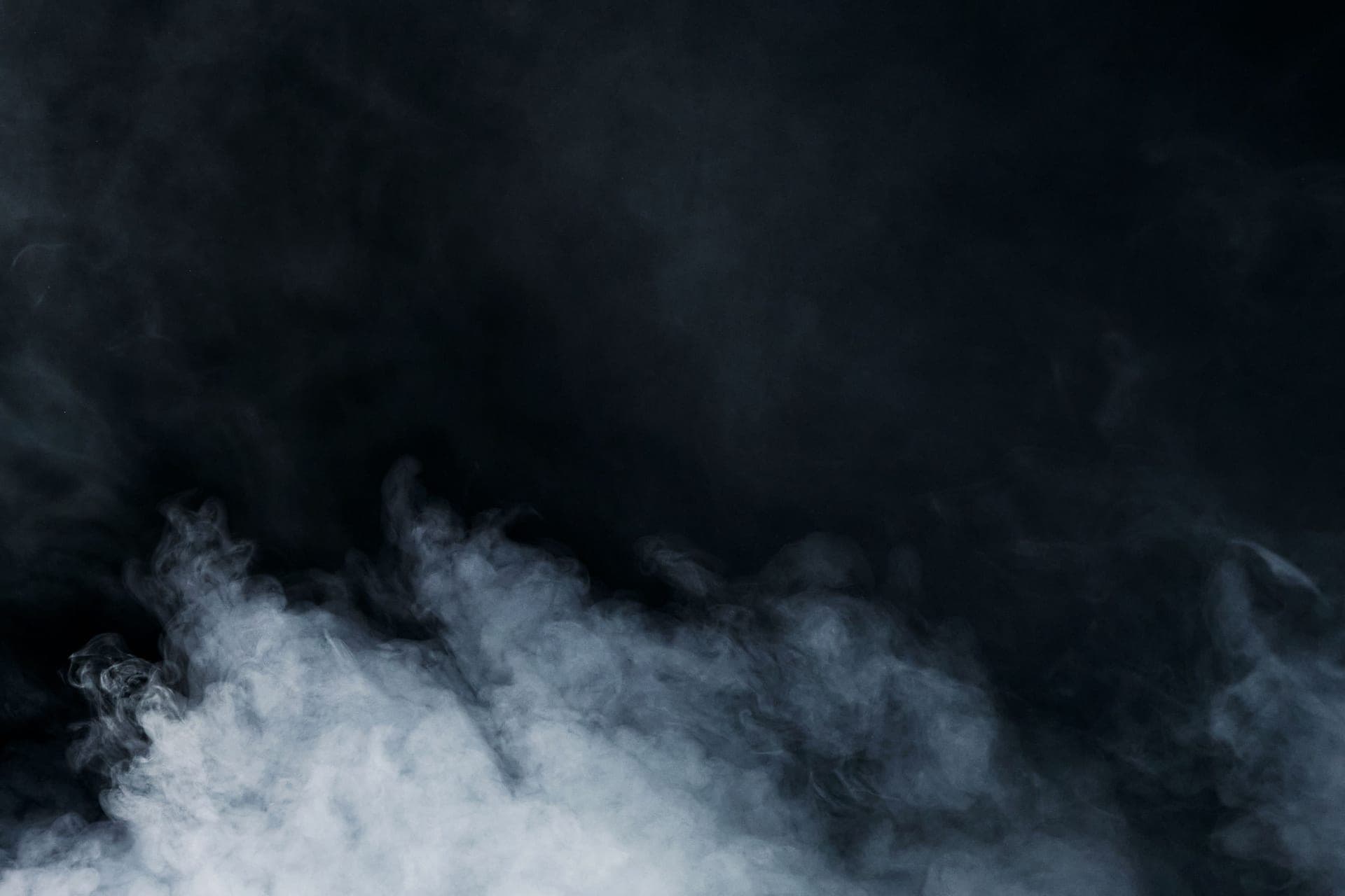 Steam rising against a dark background